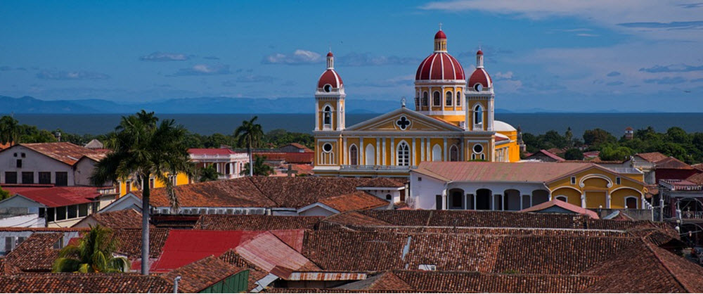 The Church in Central Granada with Lake Nicaragua in the background.